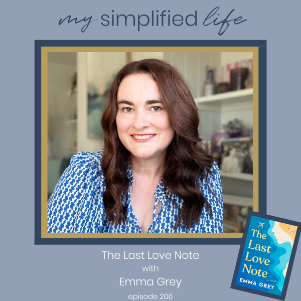 Emma grey - female author with bookshelf behind her